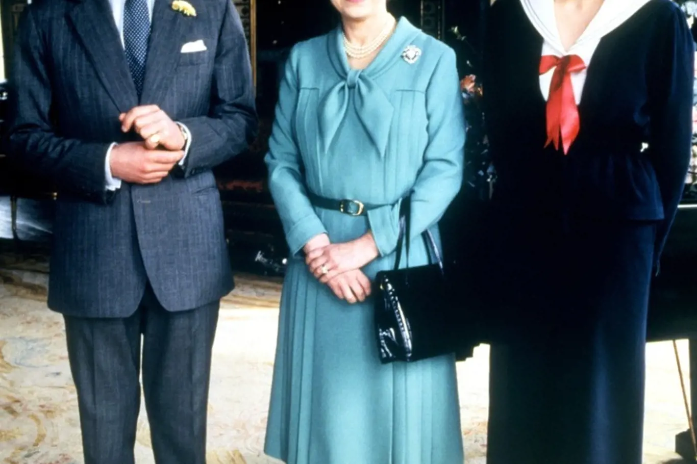 Princezna Diana s královnou Alžbětou a princem Charlesem